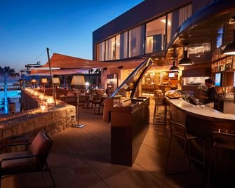 Evening on the outdoor bar and dining terrace